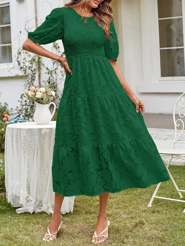 Green floral textured tiered midi dress by Klaire, featuring lightweight fabric and a flattering tiered design.