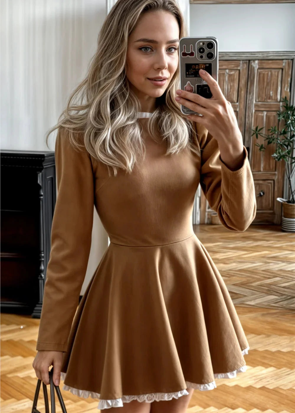 Brown long-sleeve mini dress with embellished collar, perfect for stylish occasions. Made from soft, comfortable fabric with…