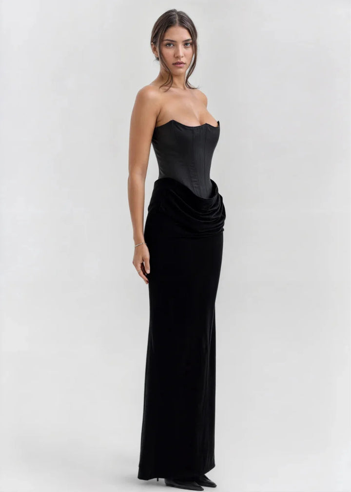 "Black velvet strapless evening dress exuding elegance and sophistication"