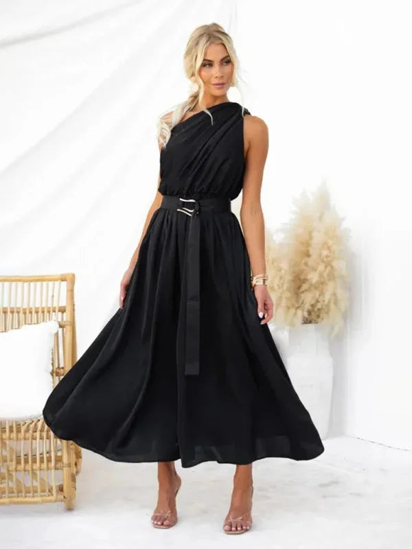 Flowy one-shoulder dress in Black with a stylish belt accent. Soft and comfortable fabric with a flattering silhouette for…