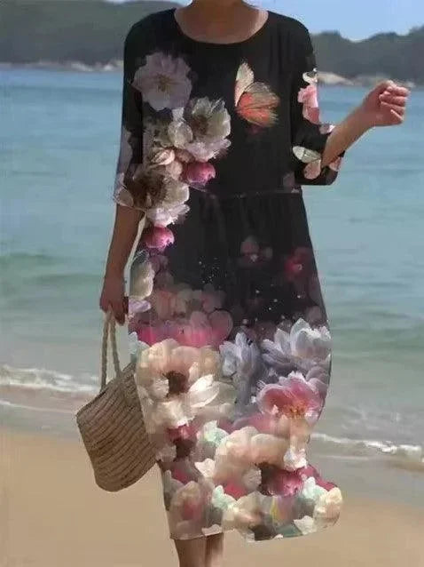 Black sleeved midi beach dress with a floral design perfect for summer days. Made of lightweight fabric ideal for staying…