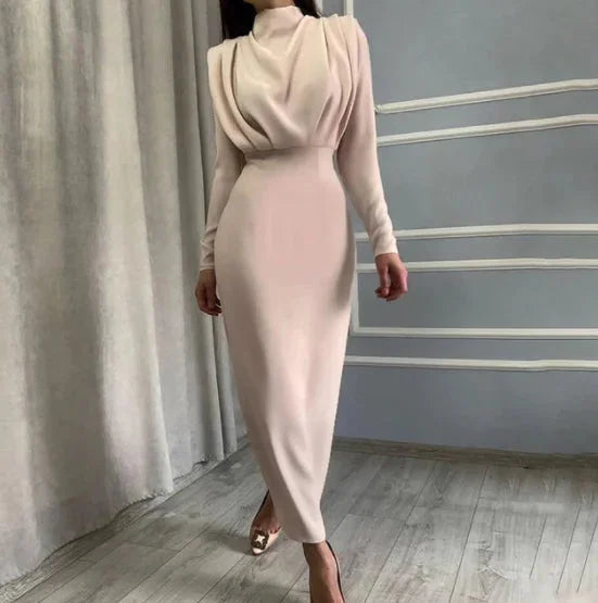 "Apricot midi dress in long-sleeve design with elegant draped back detail, perfect for a sophisticated and chic look."