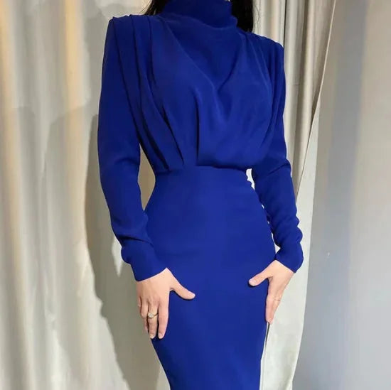 Navy blue midi dress with long sleeves and draped back, perfect for a chic and sophisticated look.