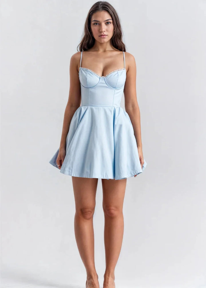 Blue flared mini dress with delicate straps made of soft, flowy fabric. Perfect for a casual yet stylish look.