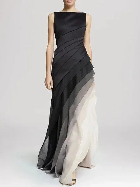 Sleeveless fitted dress in black to gray ombre, made from stretchy fabric with a gradient color design.