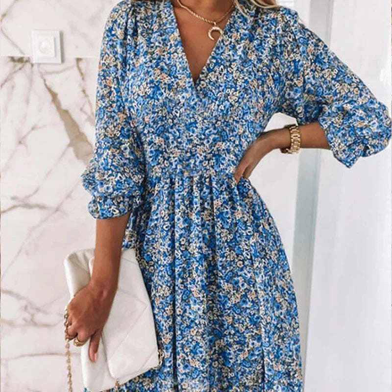 Blue floral Boho dress with V-neckline, perfect for casual outings. Made of lightweight, breathable fabric for all-day…