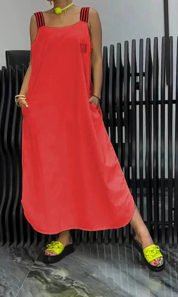 Red sleeveless maxi dress with pockets. Relaxed fit, perfect for summer. Made with soft, breathable fabric. Casual and…