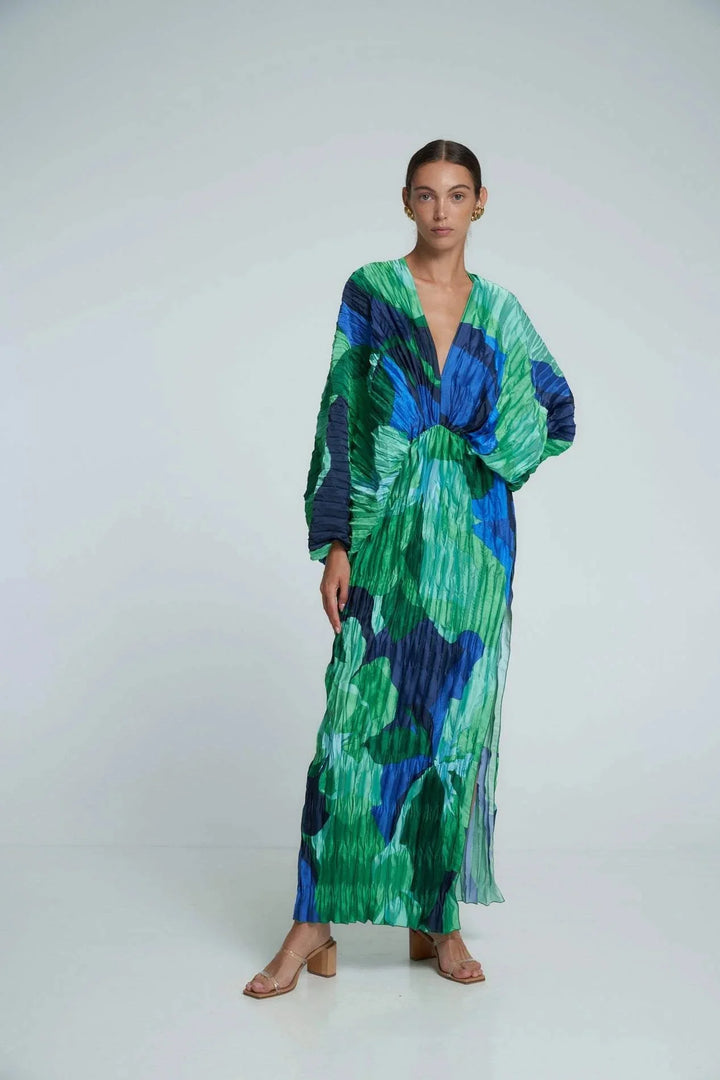 "Green and blue print V-neck kaftan with a relaxed fit, perfect for summer days. Made from lightweight and breathable…