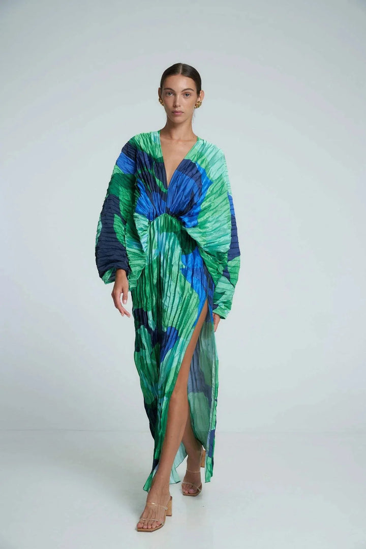 Green and blue print V-neck kaftan made with lightweight, flowy fabric. Perfect for a stylish and effortless summer look.