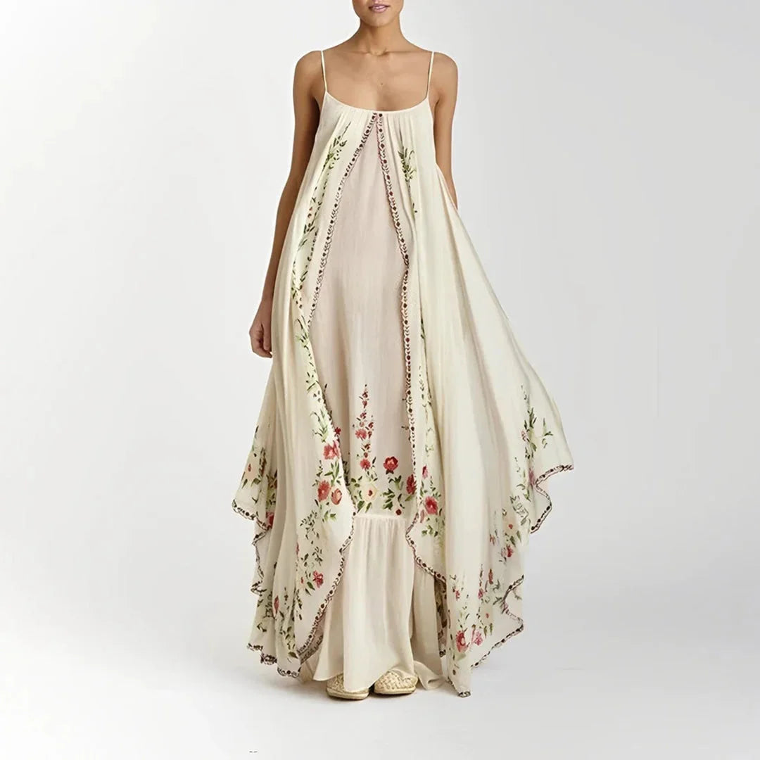 Beige floral maxi dress with spaghetti straps, crafted from a lightweight and flowy fabric.