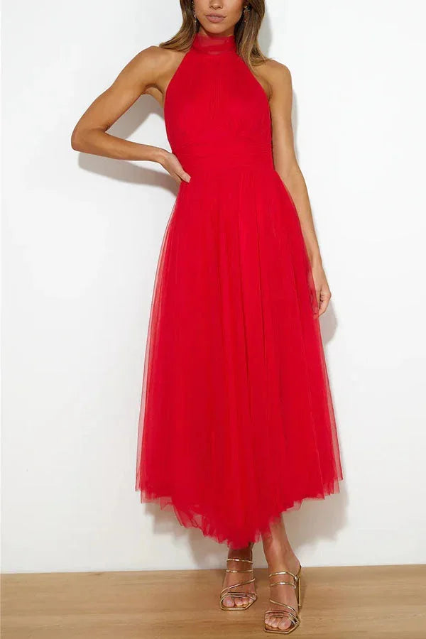 Red halter neck pleated midi dress with a flattering silhouette, perfect for a stylish and elegant look.