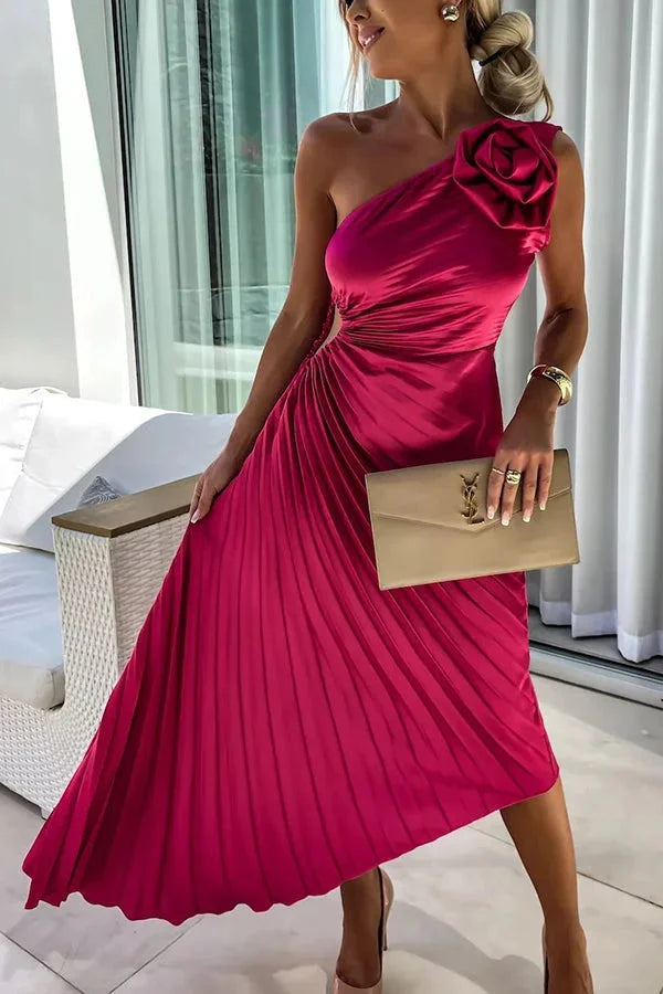 Red pleated midi dress with one-shoulder design. Made from flowy fabric, perfect for elegant occasions or nights out.