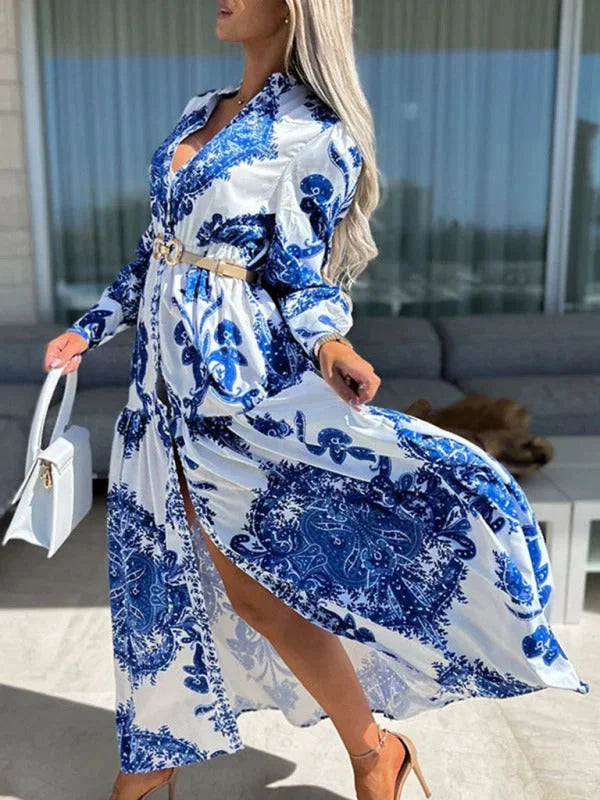 Navy paisley print maxi dress with elegant high slit, perfect for a chic and stylish look.