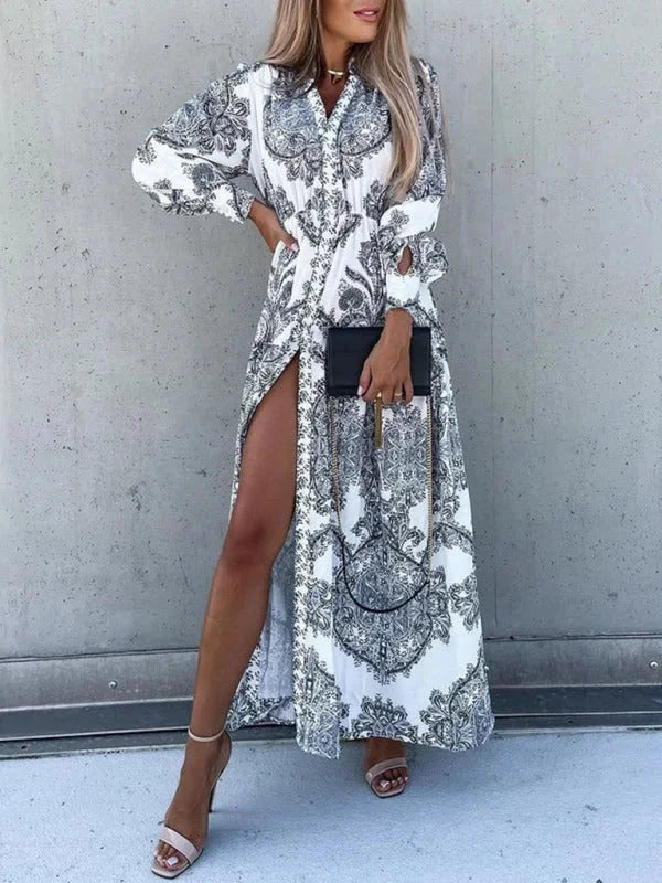 "Grey maxi dress featuring elegant high slit and paisley pattern, perfect for a chic and sophisticated look."