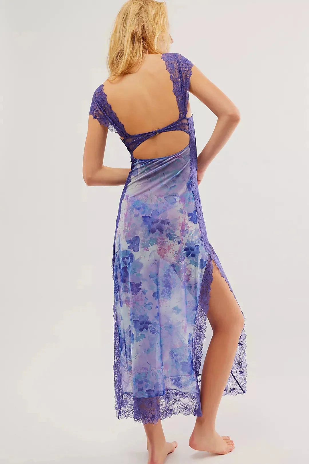 "Mitzi sheer maxi dress featuring vibrant floral print, flowing silhouette, perfect for summer days"