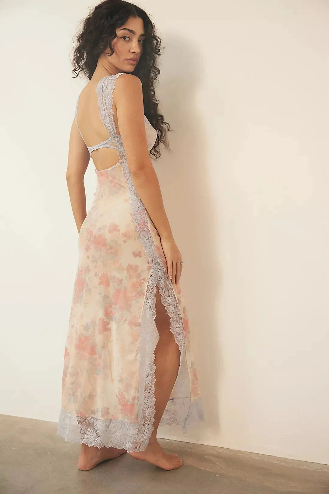 Sheer maxi dress with floral print in delicate fabric perfect for summer.