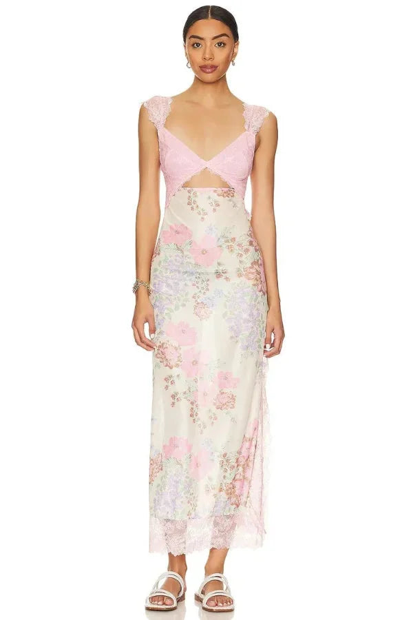 Sheer maxi dress with a floral print in lightweight fabric, perfect for casual or summer wear.