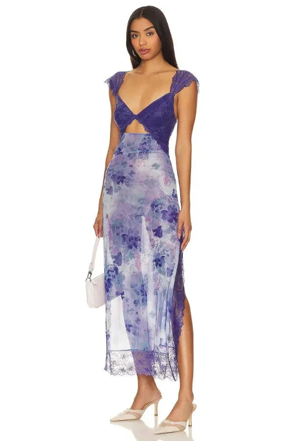 Sheer maxi dress with floral print in soft chiffon fabric, perfect for a sunny day outing or beach vacation.