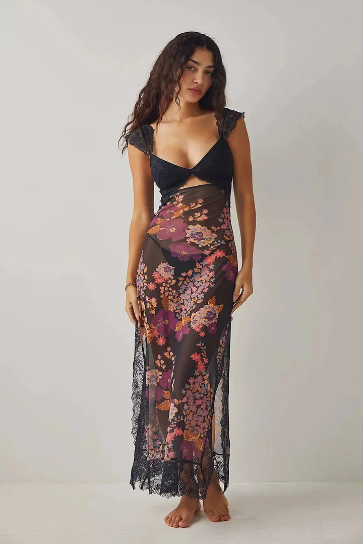 Sheer maxi dress with a floral print in soft chiffon fabric, perfect for a summer day out.