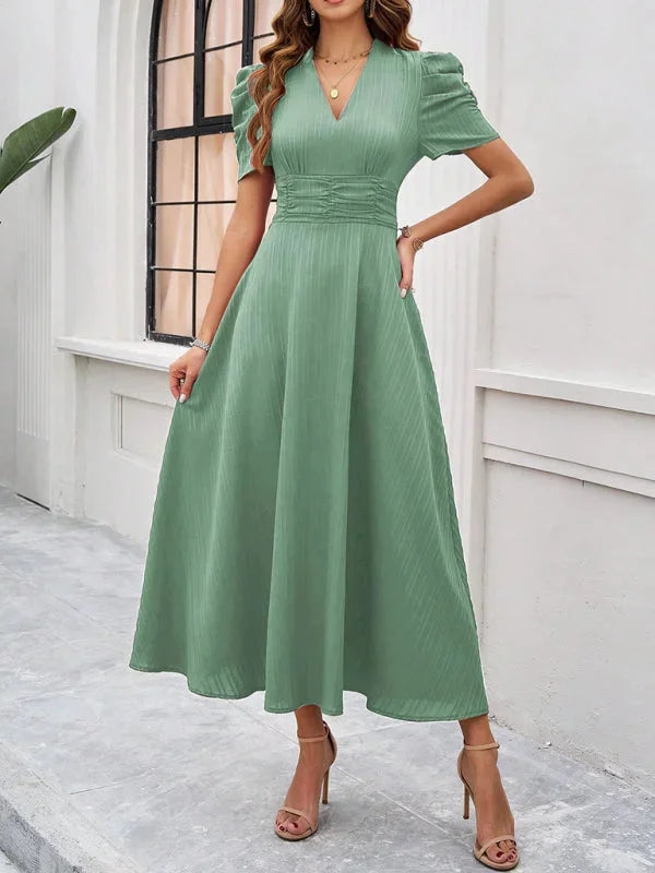 V-neck flowy midi dress in a soft, breathable fabric with puff sleeves - Myleigh.