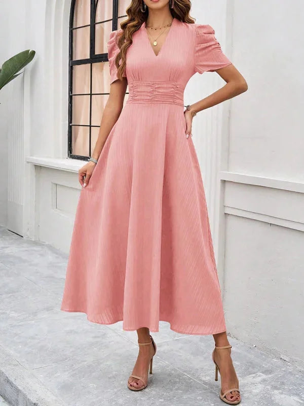 "Flowy midi dress with puff sleeves and a V-neck design in a lightweight fabric - Myleigh dress"