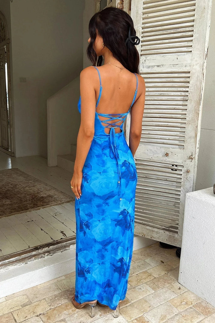 Blue floral maxi summer dress featuring a delicate floral pattern on a smooth and breathable fabric perfect for warm weather…