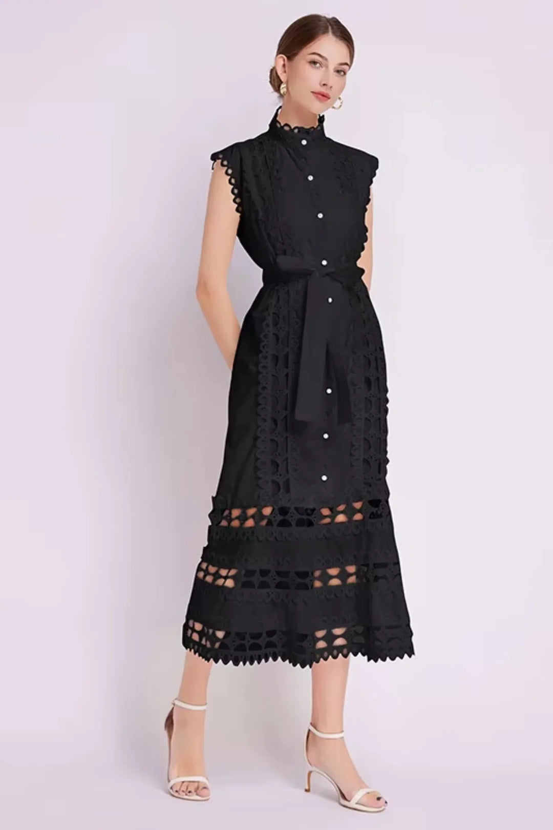 Sleeveless lace midi dress with belted waist, perfect for a special occasion. intricately designed lace overlay with a…