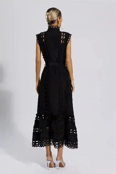 "Sleeveless lace midi dress with belted waist in a delicate design, perfect for elegant occasions"