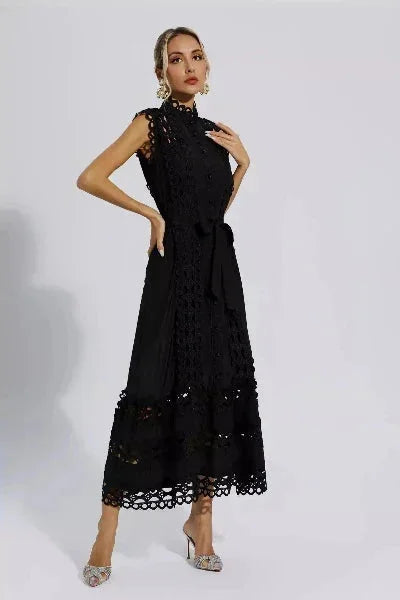 Sleeveless lace midi dress featuring a belted waist, a perfect choice for a chic and elegant look.