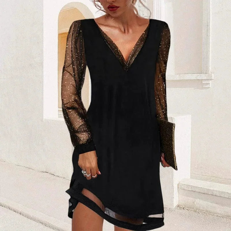 Black V-neck mini dress with sheer sleeves, crafted in breathable material. Chic and elegant design perfect for any occasion.