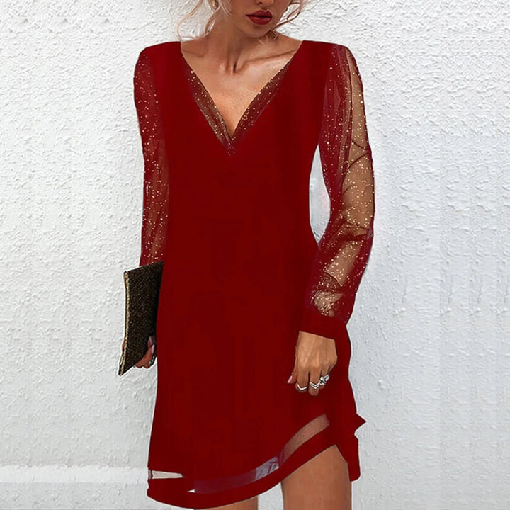 Red V-neck mini dress with sheer sleeves, perfect for a night out. Made with lightweight fabric and stylish design.