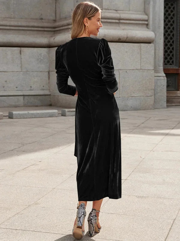 Black velvet wrap dress with puffed sleeves, elegant and stylish design for any occasion, perfect blend of comfort and…