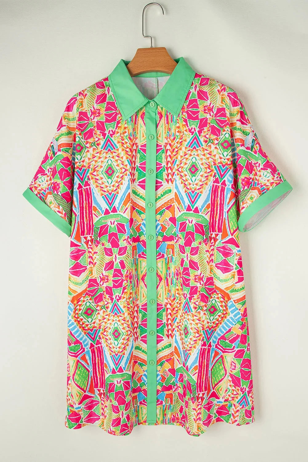 "Nura shirt dress in vibrant colors with button-down detail, perfect for casual and formal wear, made of high-quality…