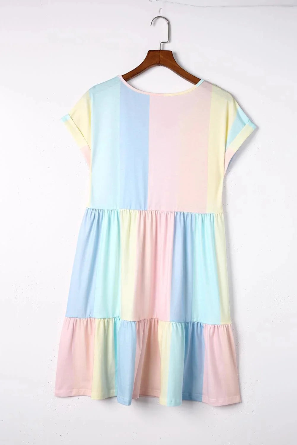 "Paetyn pastel mini dress with flutter sleeves, featuring a soft and flowy fabric in a delicate pastel color palette."