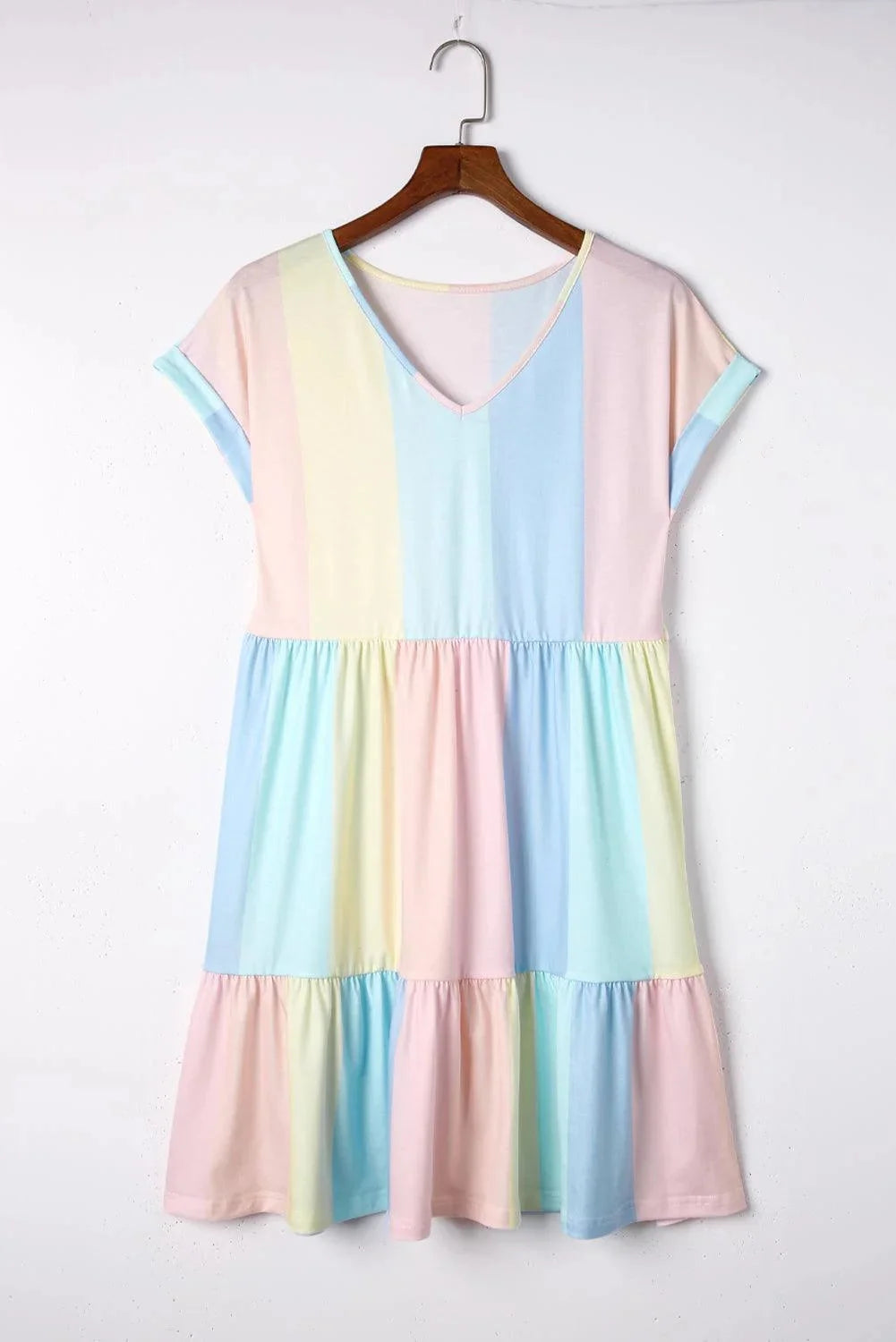 "Pastel mini dress with flutter sleeves in soft fabric, perfect for a breezy day out."