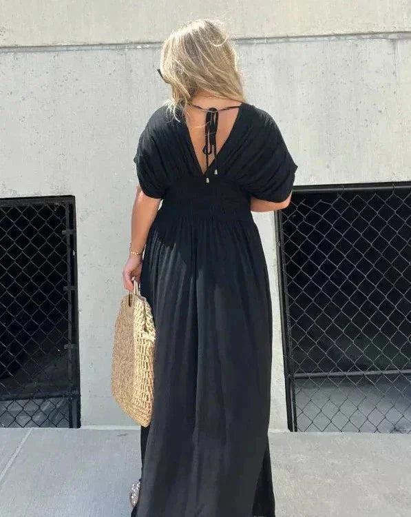 "Prudence maxi dress in flowy fabric with elastic waist, ideal for a casual and comfortable look."