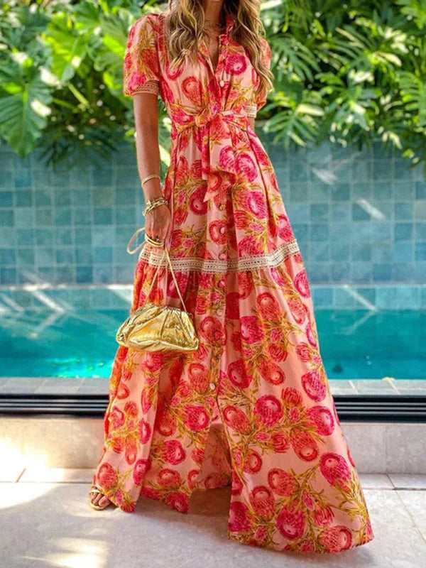 Coral pink floral dress with delicate lace accents, perfect for summer days, made from high-quality fabric.