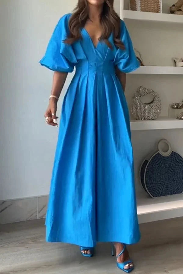 "Renlee midi dress in vibrant blue with v-neck and kimono sleeves, perfect for a stylish and comfortable casual look."