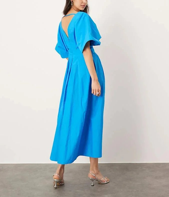 "Renlee vibrant blue dress with V-neck, kimono sleeves, and midi length. Soft and flowy material perfect for effortless…