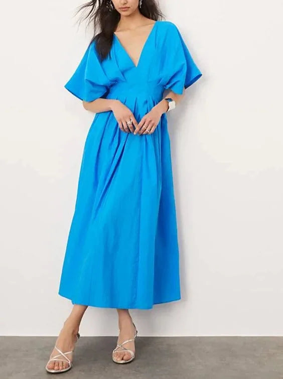 Renlee midi dress in vibrant blue with a V-neck, kimono sleeves, and midi length, perfect for casual or evening wear.