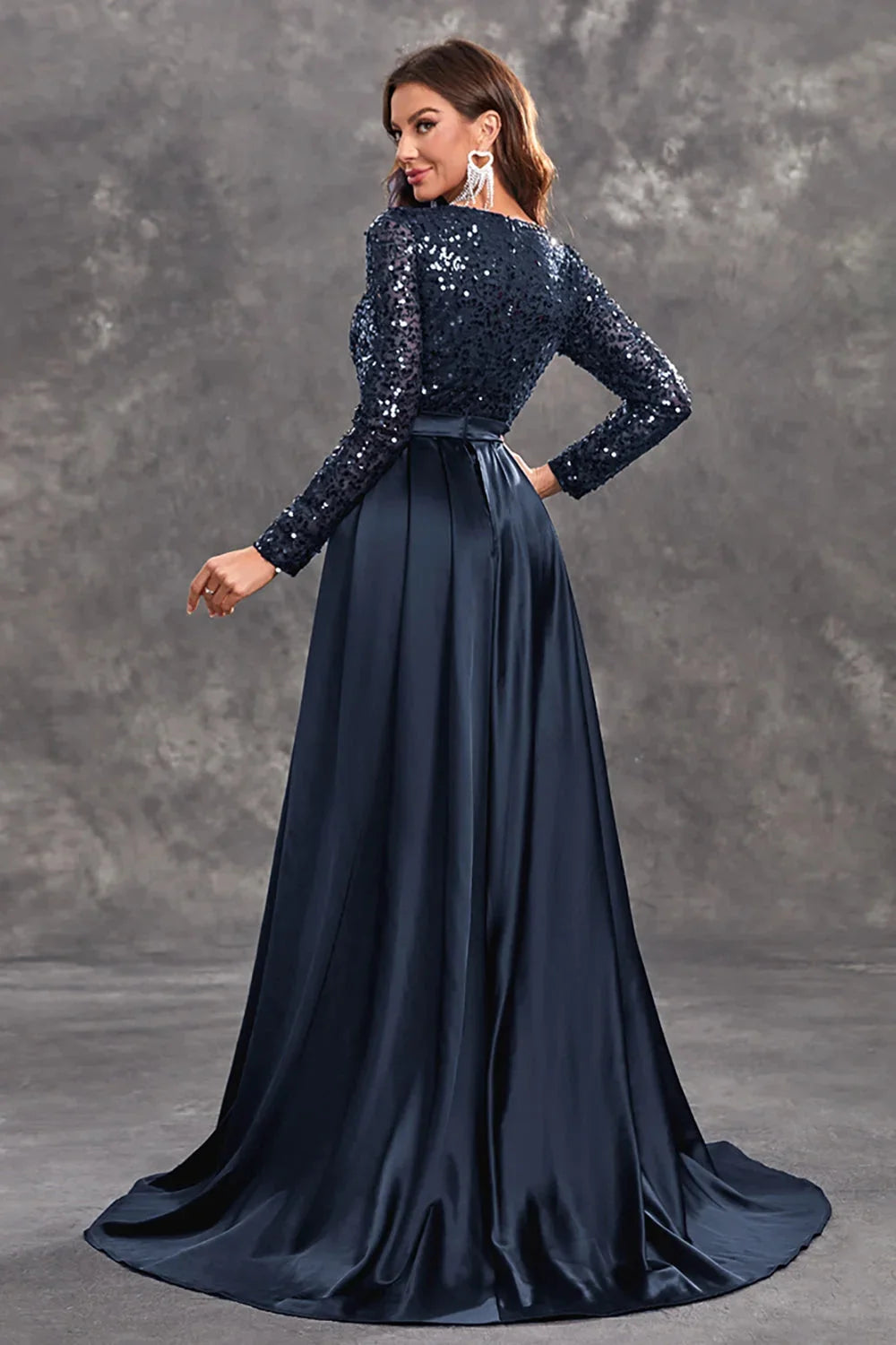 Sequined bodice evening dress with flowing chiffon skirt in Rhodes design.