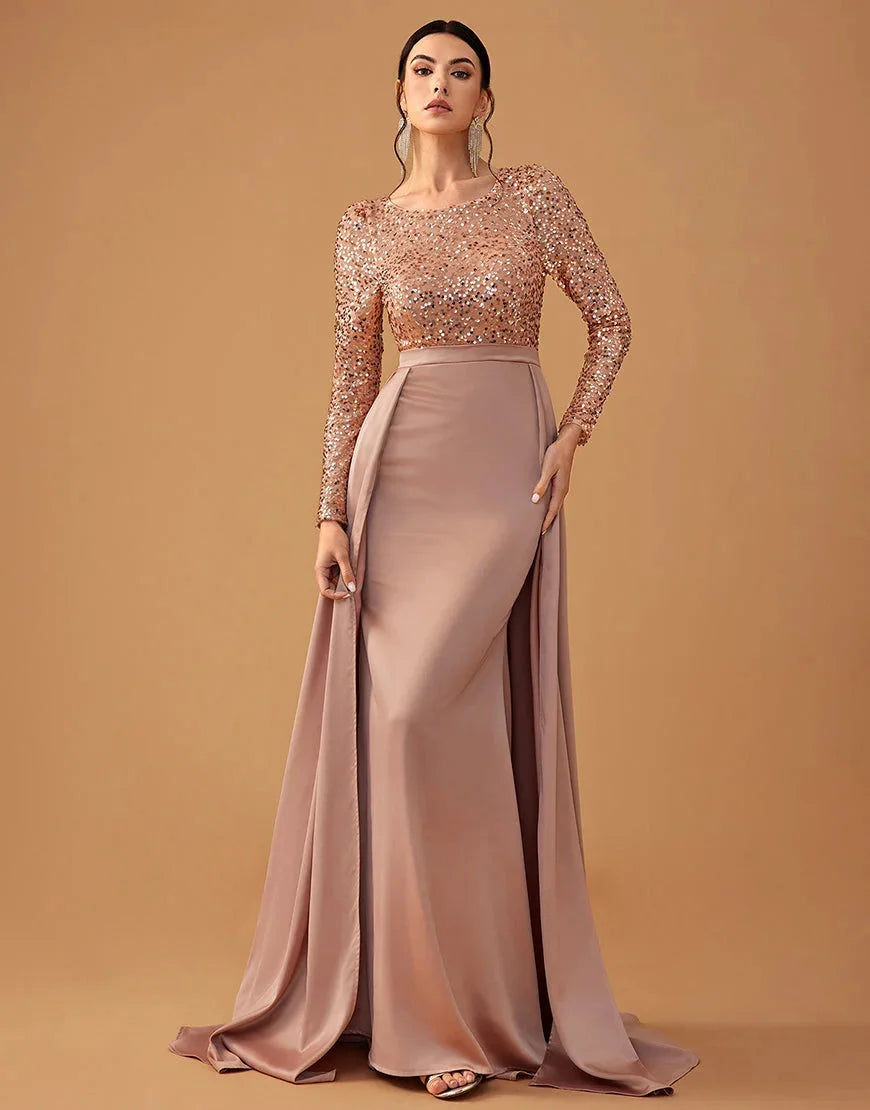 Blush evening dress with sequined bodice and flowing skirt, perfect for special occasions.