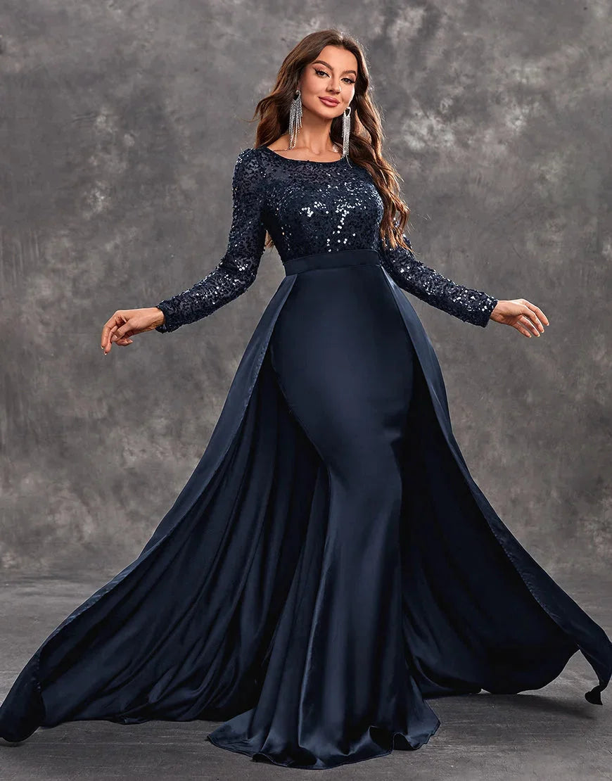 "Navy sleeveless evening gown with sequined bodice and flowing skirt."