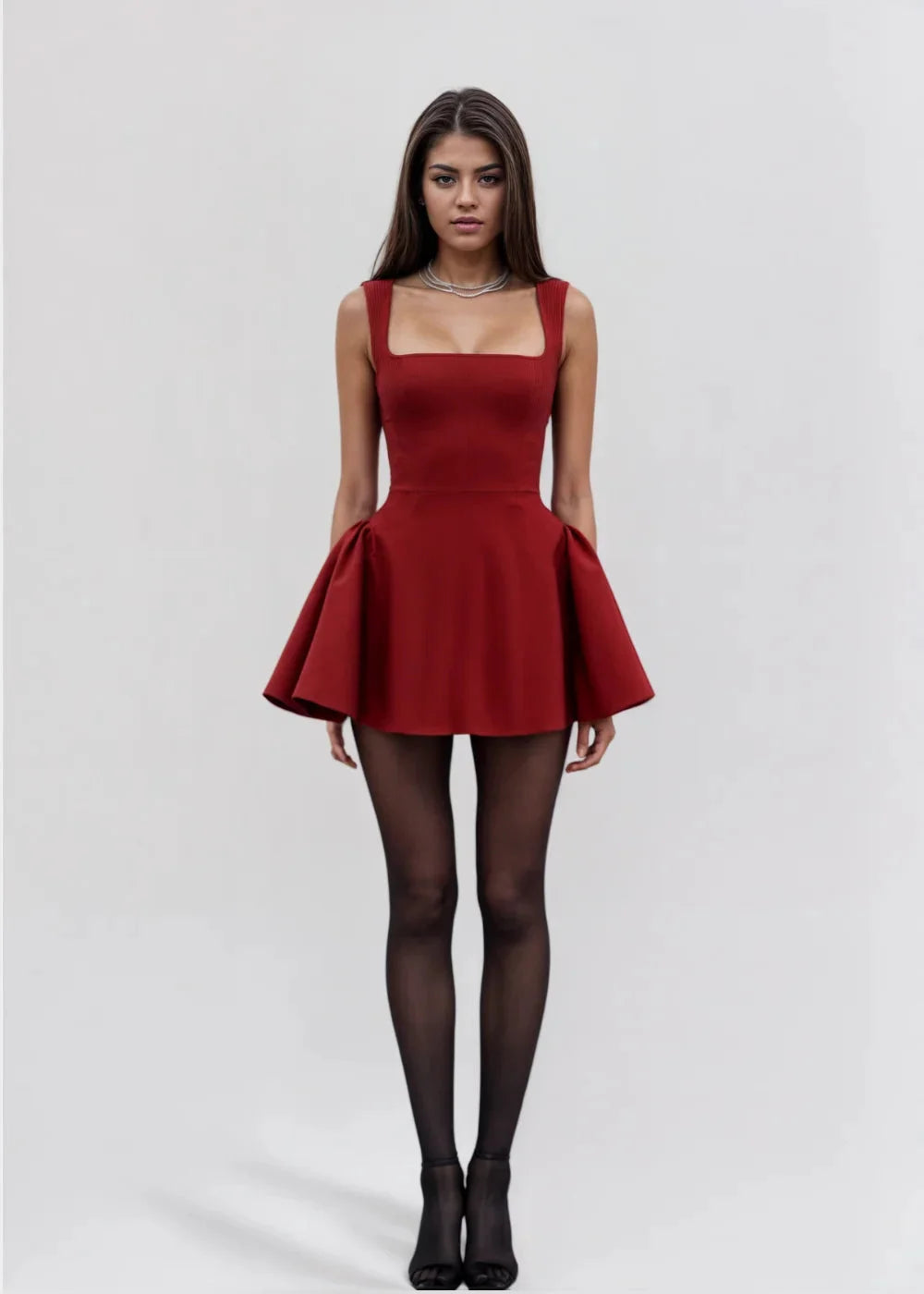 Red mini dress with square neckline, flared skirt. Soft and comfortable fabric. Perfect for a casual yet elegant look.