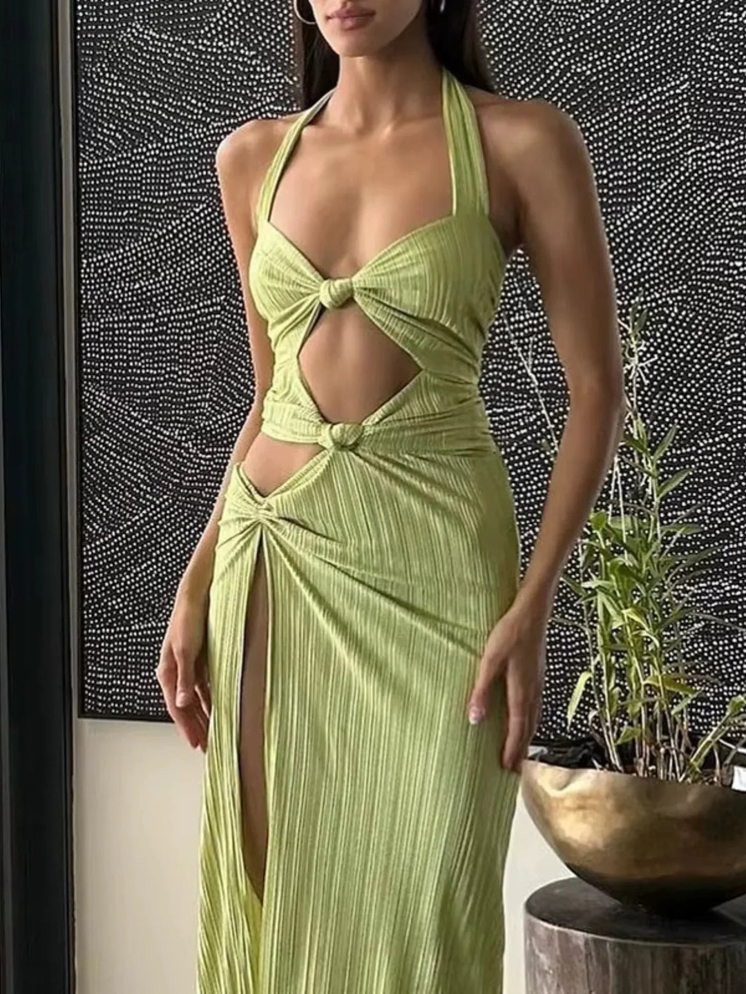 "Rivkah lime green maxi dress with slit, crafted in lightweight chiffon fabric, perfect for a breezy and stylish look."