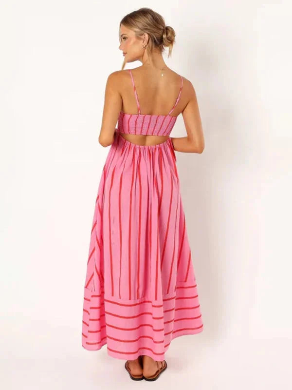 "Striped maxi sundress with delicate straps in lightweight and airy fabric, perfect for summer days."