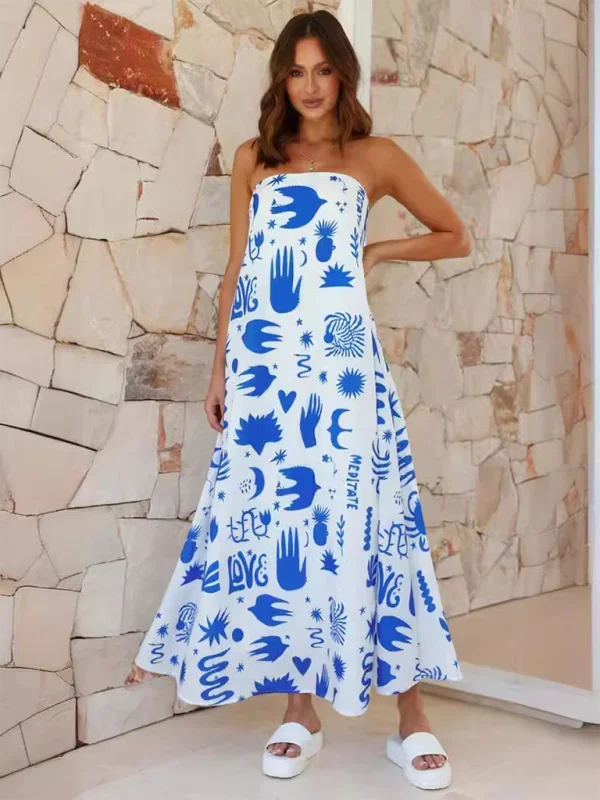 Strapless maxi dress with vibrant prints, perfect for a breezy summer day. Crafted from flowing fabric for a comfortable fit.