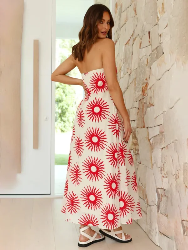 "Strapless maxi dress with vibrant prints, crafted from flowing and breathable material, perfect for summer outings and…