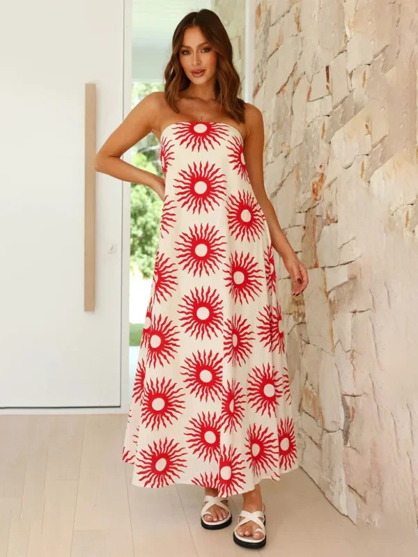 Strapless maxi dress with vibrant prints crafted from flowing and lightweight fabric for a breezy summer look.