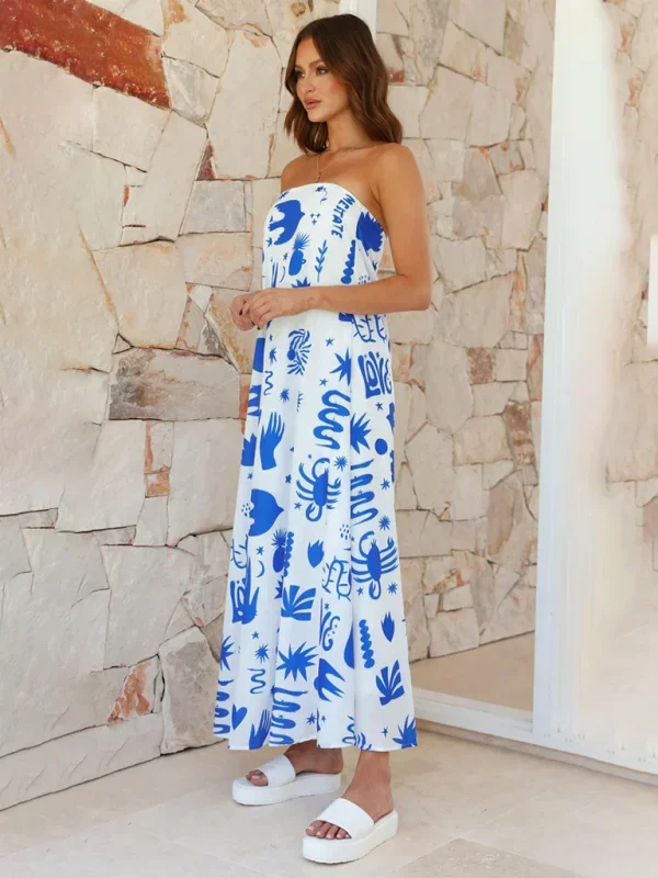 Strapless maxi dress with vibrant prints, flowing fabric, and a flattering silhouette.